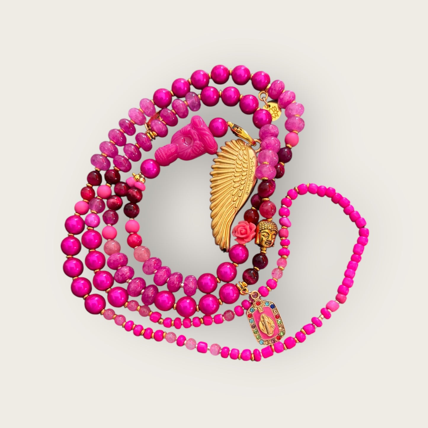 Lange Perlenkette mit Buddha und Engelsflügel Anhänger