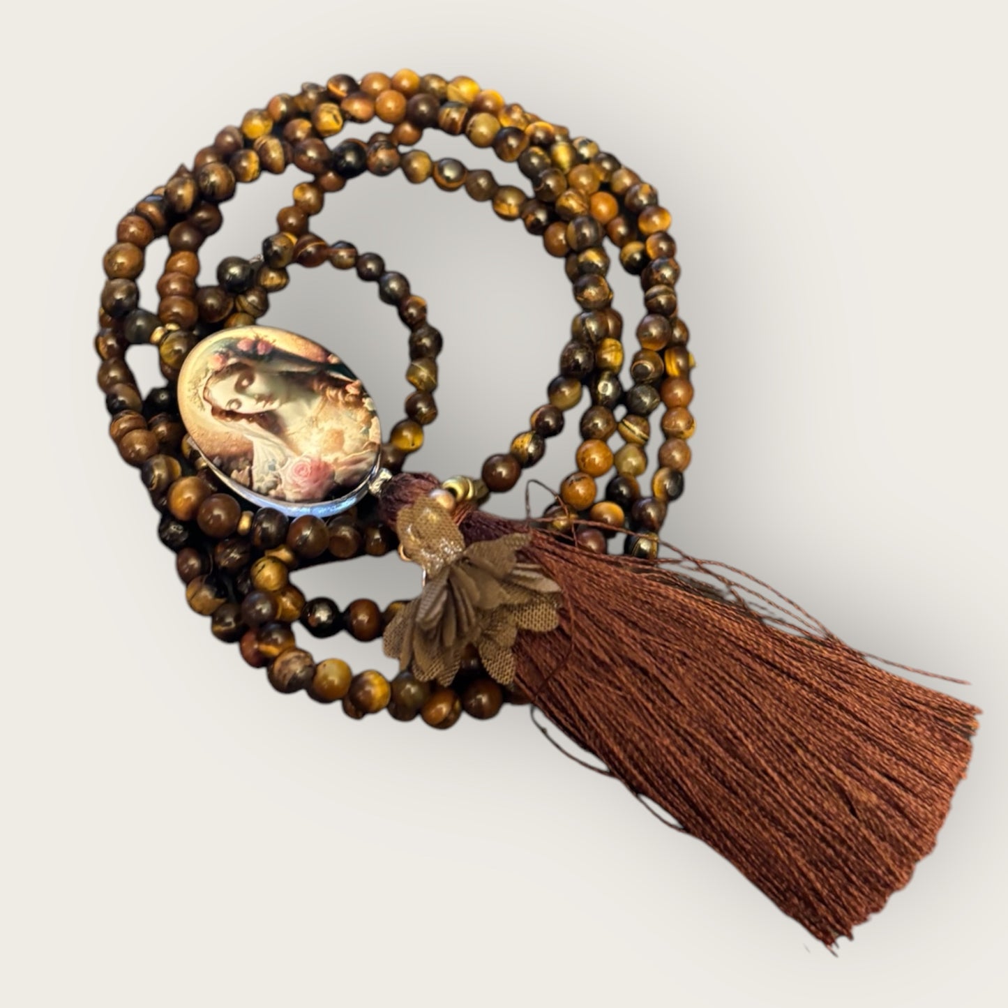 Kette aus Tigerauge mit Madonna