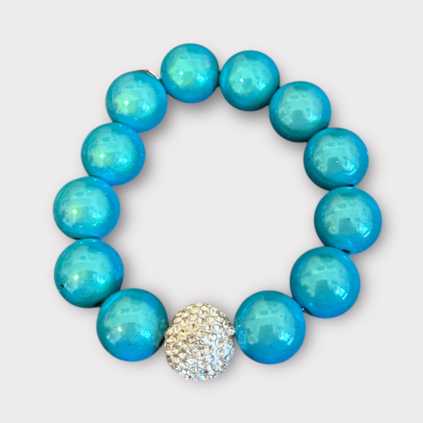 Armband aus Magic Perlen in türkis
