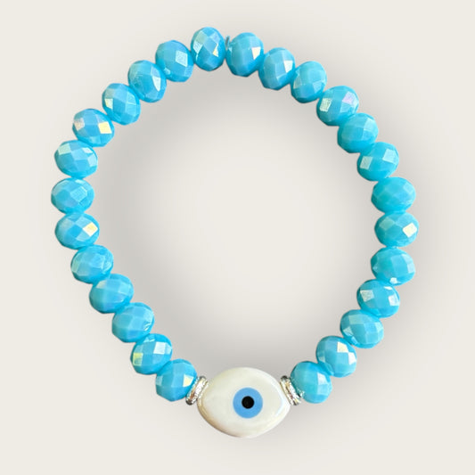 SARDINIEN - Armband in helltürkis mit einer Perle Nazar Auge