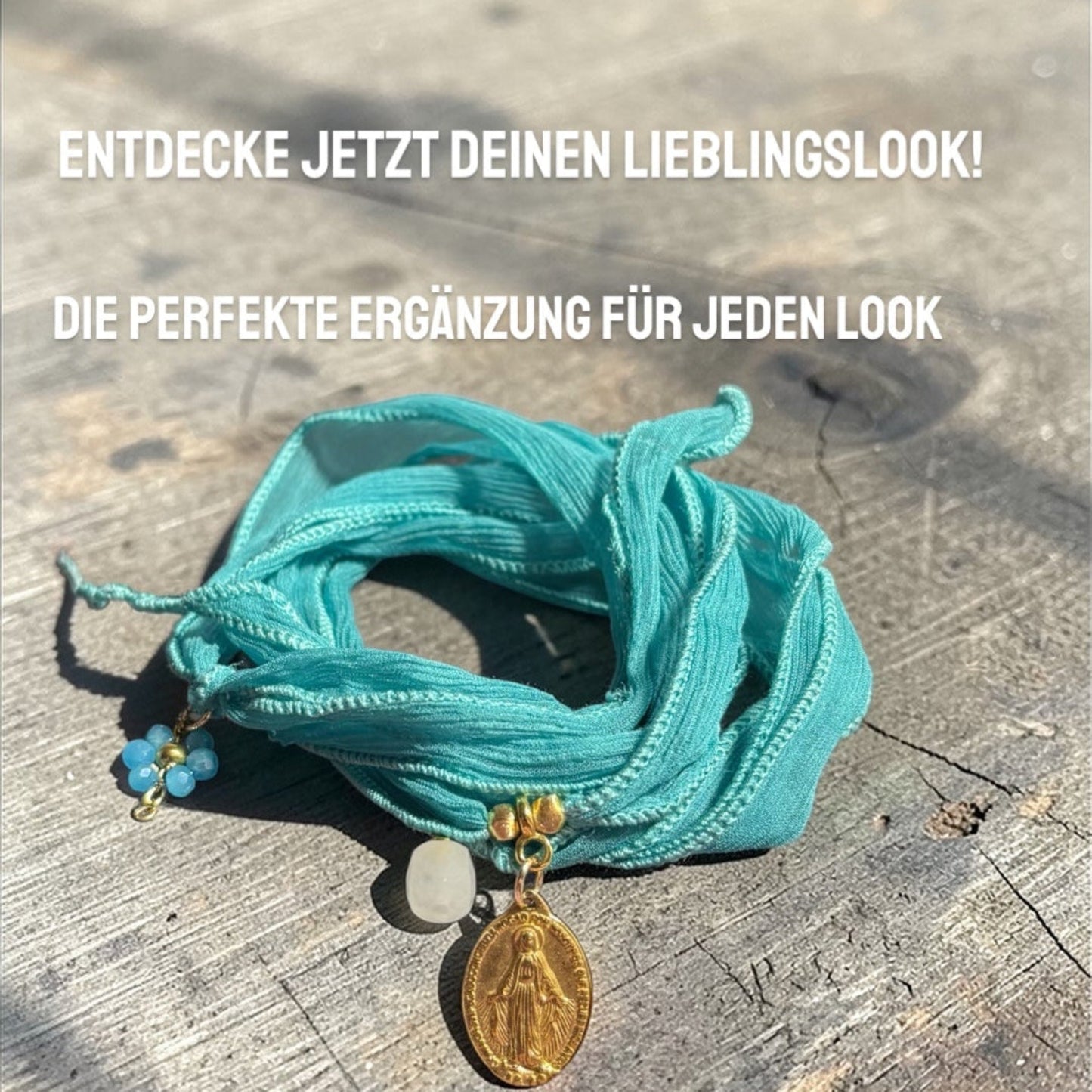 Wickelarmband aus Seide  mit vergoldetem Madonna Anhänger