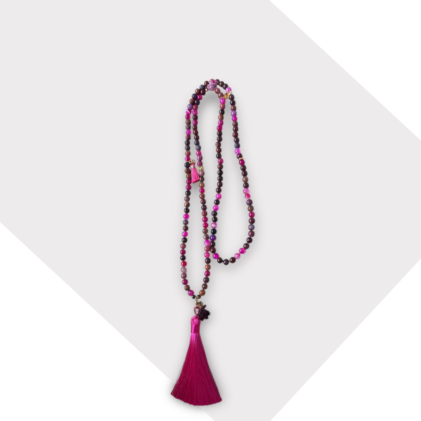 Perlenkette mit Quaste in pink