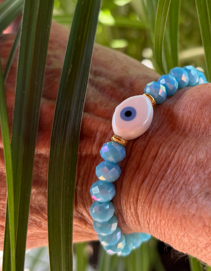 SARDINIEN - Armband in helltürkis mit einer Perle Nazar Auge
