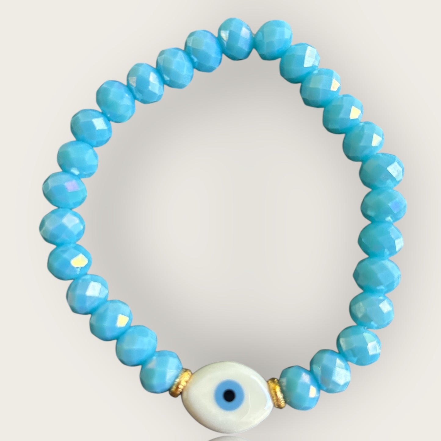 SARDINIEN - Armband in helltürkis mit einer Perle Nazar Auge