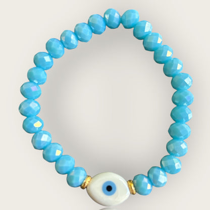 SARDINIEN - Armband in helltürkis mit einer Perle Nazar Auge