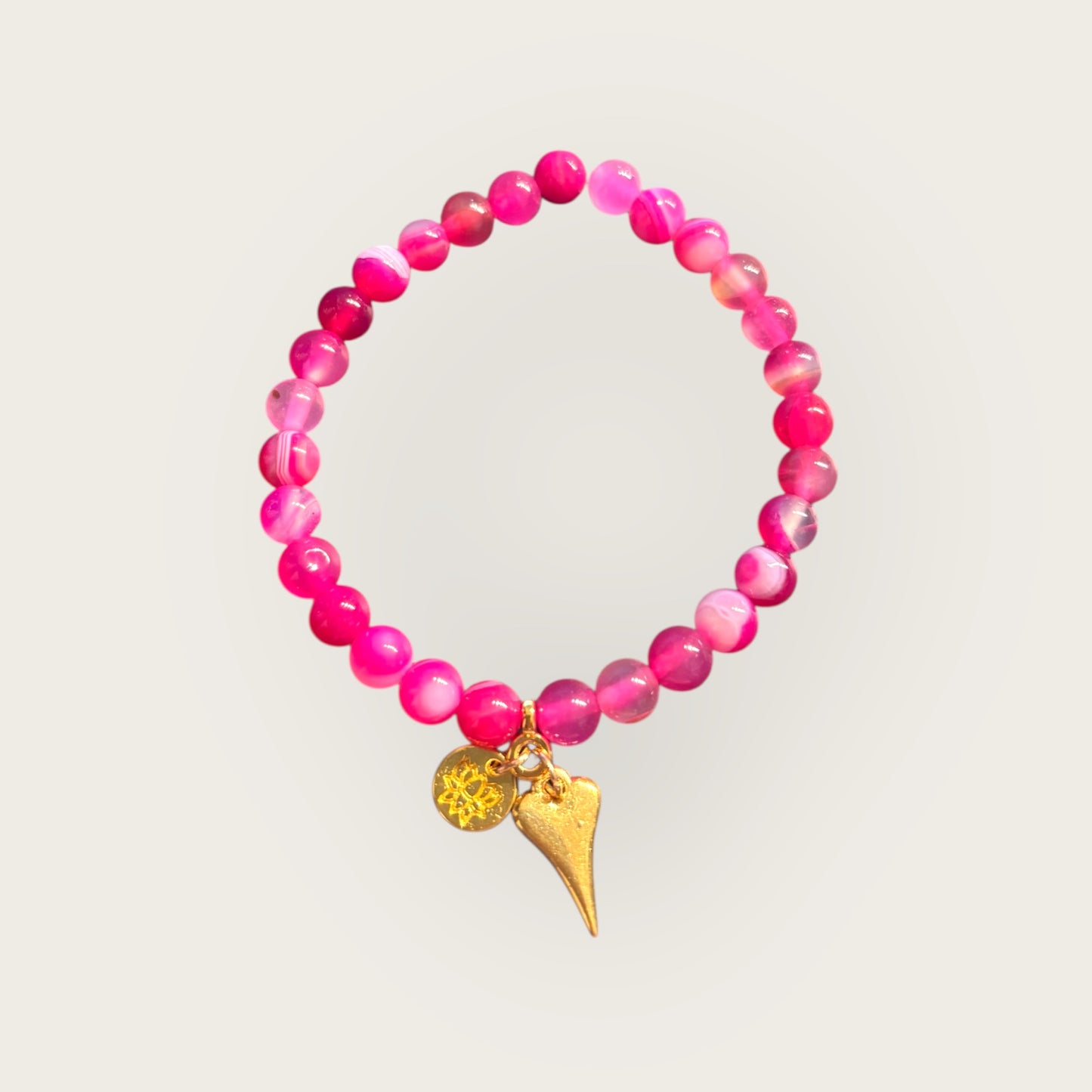 Armband pink mit Herzanhänger