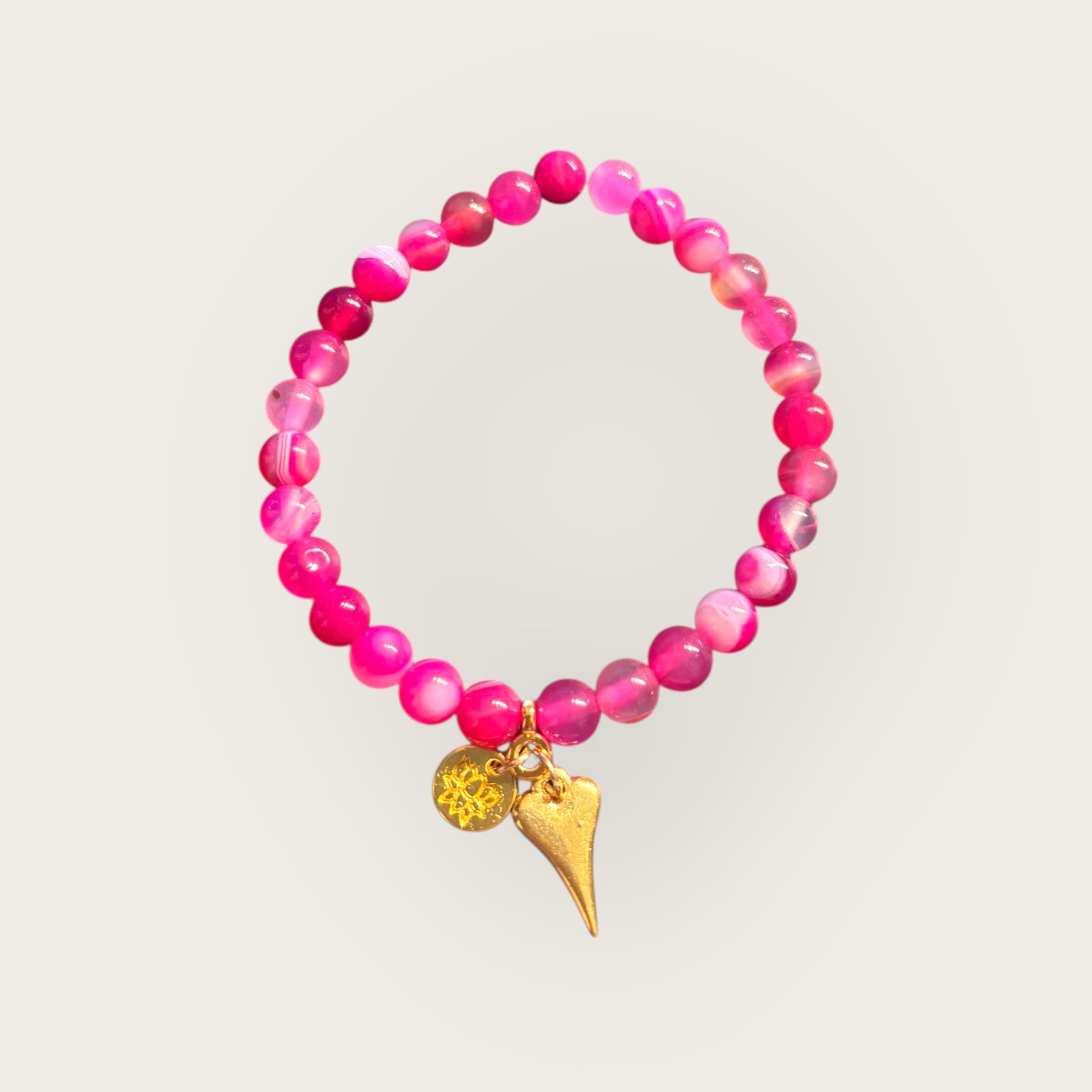 Armband pink mit Herzanhänger