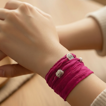 seidenband-zum-wickeln-in-pink-mit-buddha-perle