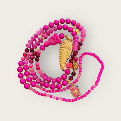 Lange Perlenkette mit Buddha und Engelsflügel Anhänger