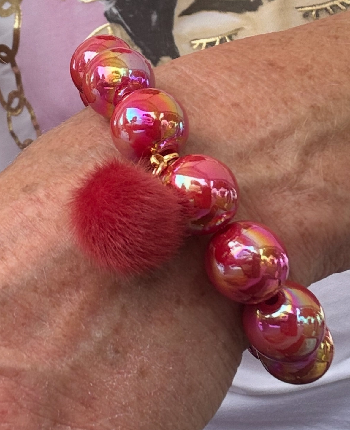 GENF -rotes Armband mit Puschel