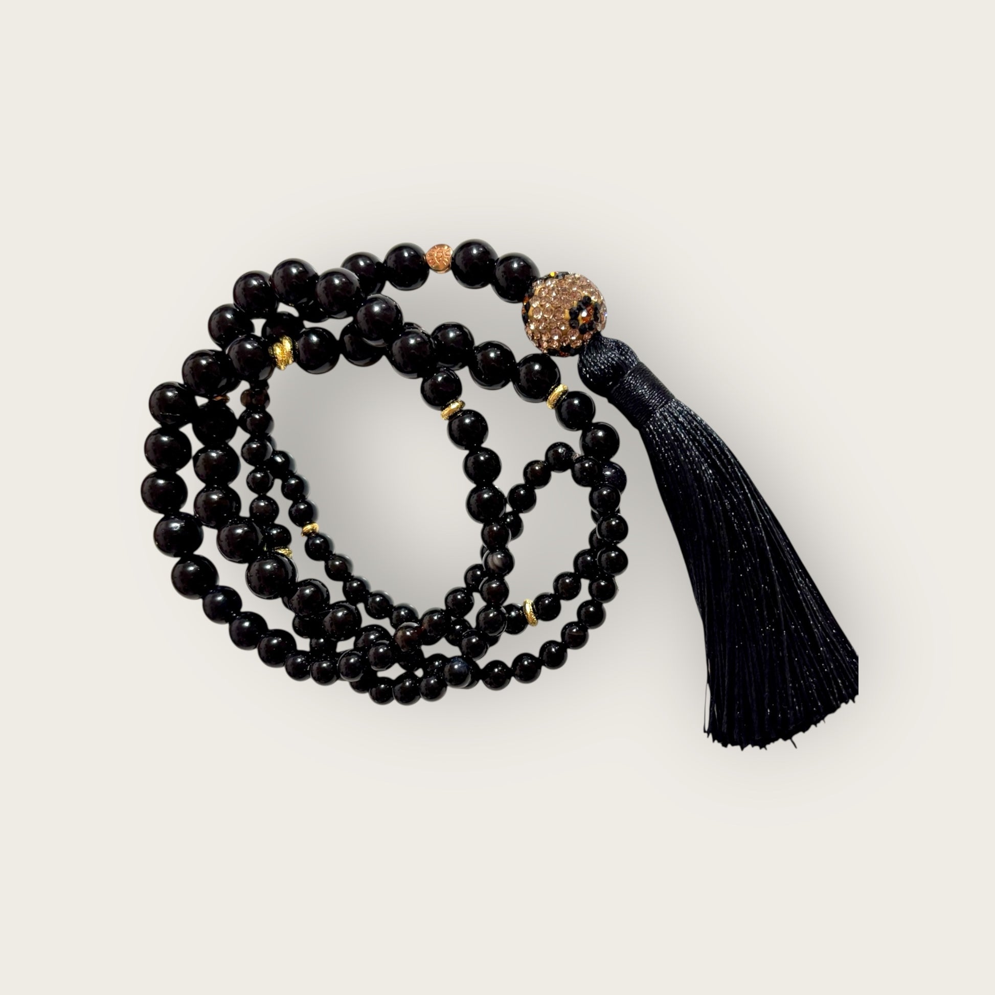 Kette schwarz mit Leo Perle und Quaste