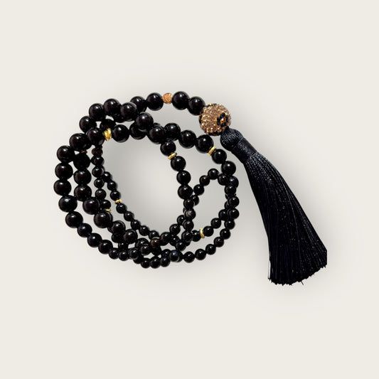 Kette schwarz mit Leo Perle und Quaste