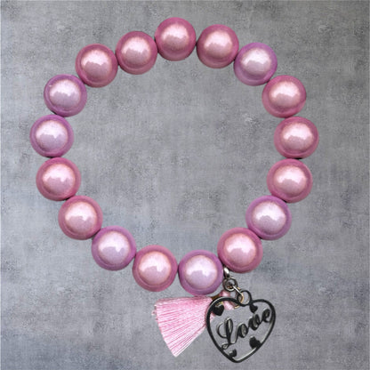 Miracle Perlen Armband in rosa mit Herzanhänger