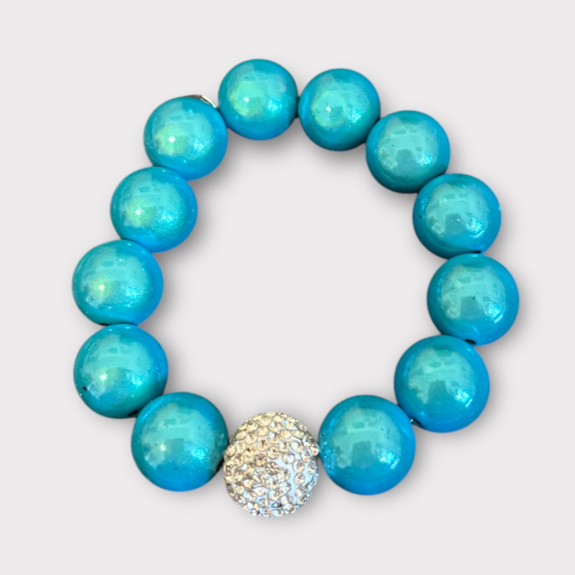 Armband aus Magic Perlen in türkis
