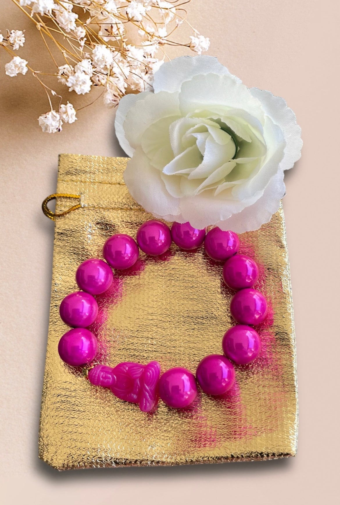 Armband KOH LANTA aus Miracle Perlen in pink mit einer Buddha Perle