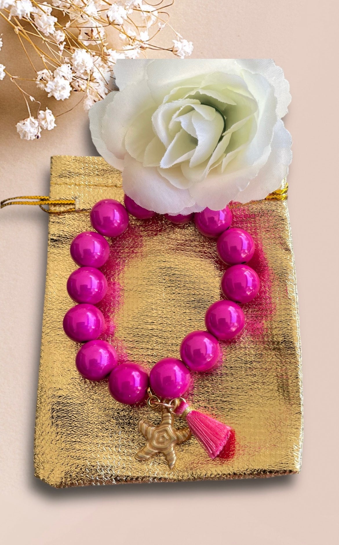 Armband ARISARA aus Miracle Perlen in pink und einem Anhänger Seestern der Firma SchauTime