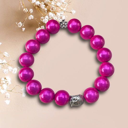 Armband MAYARI aus leuchtenden Miracle Perlen in pink mit einer Perle Buddha