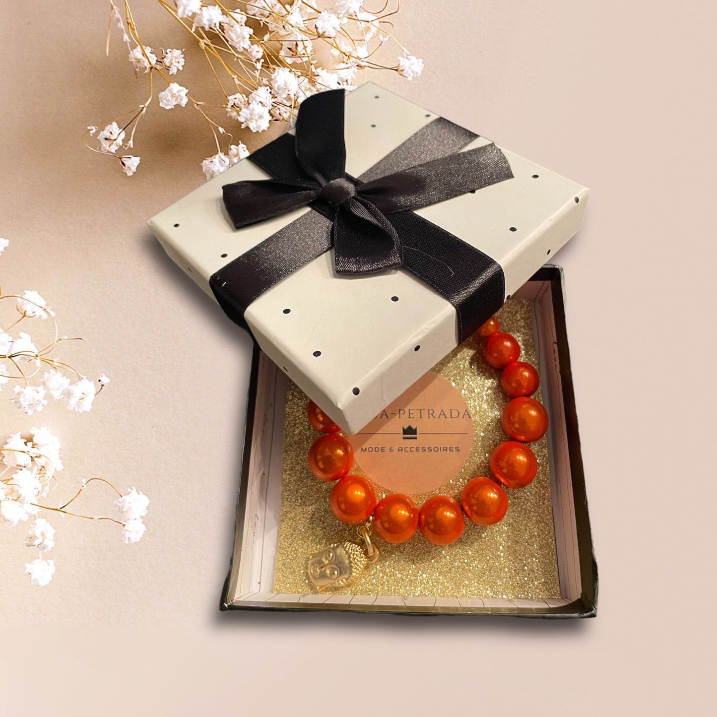Armband SUNSHINE aus Miracle Perlen  in orange mit einem Anhänger Buddha der Marke SchauTime
