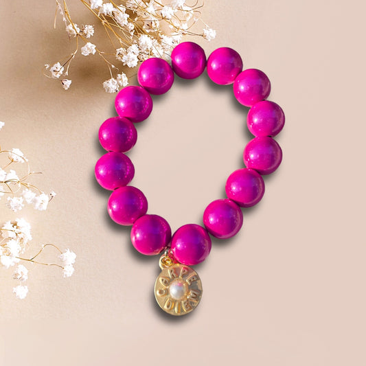 Armband JELLA aus Miracle Perlen in pink mit einem Anhänger CARPE DIEM