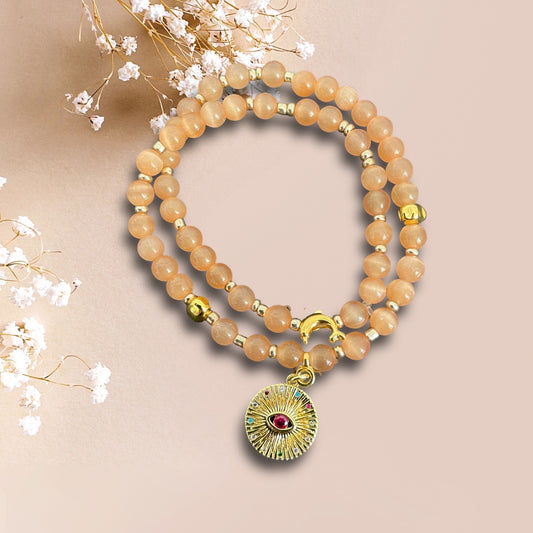 Wickelarmband aus Cateye Perlen mit einem Anhänger Mandala