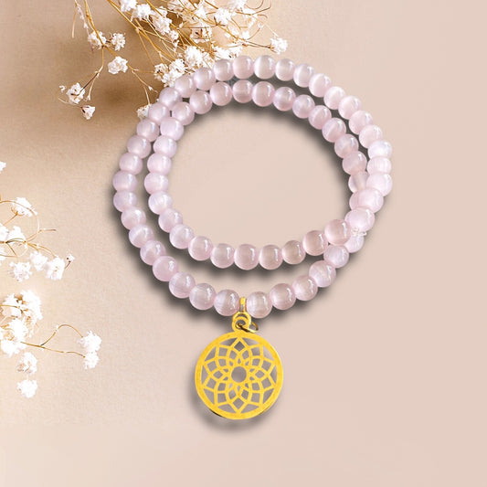Armband AMALIA aus rosa cateye Perlen mit einem Anhänger Blume des Lebens