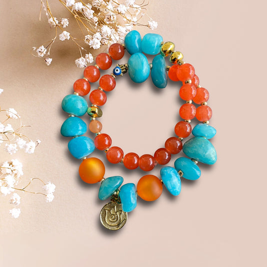 Armband VENEZIA aus Perlen in türkis und orange mit einem Anhänger Blume
