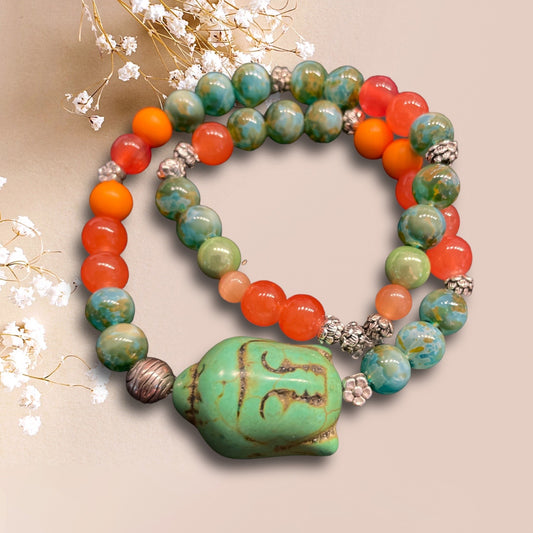 Armband EDINA aus einem Perlenmix in grün und orange mit  einer Buddha Perle
