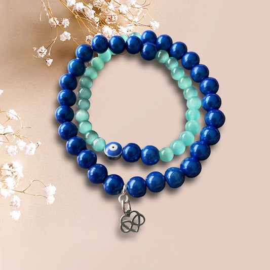 Armband NAZAR aus Perlen in türkis und blau mit einem Anhänger Infinity Love