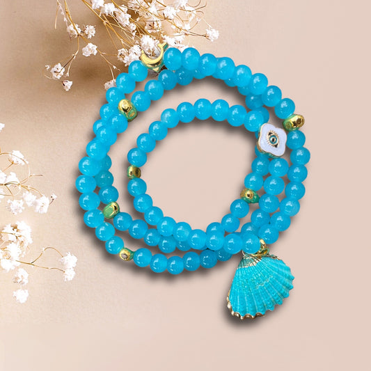 Armband BLUE SHELL aus Perlen in türkis mit einem Anhänger Muschel